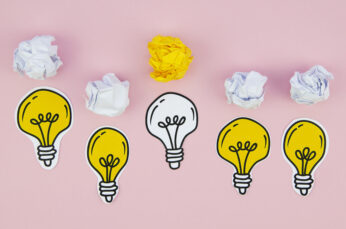 knowledge management light bulbs with crumpled paper